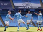 bek-inggris-manchester-city-john-stones-2l-merayakan-mencetak-gol-kedua-timnya.jpg