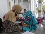 belajar-membaca-al-quran-sejak-dini_20200909_215354.jpg