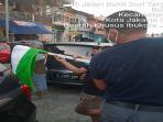 bendera-palestina-di-bukit-duri-tebet-diturunkan.jpg