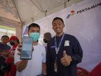 berhasil-salah-seorang-pendaftar-subsidi-tepat-di-klinik-offline-spbu-poltek-manado.jpg