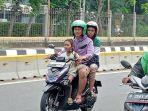 berkendara-dengan-membawa-anak-harus-lebih-memperhatikan-keamanan.jpg