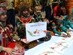 berpakaian-adat-aksi-damai-indonesia-satu_20190822_222629.jpg