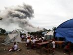 bersekolah-di-tengah-erupsi-gunung-sinabung_20170718_172135.jpg