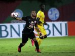 bhayangkara-fc-vs-persija-jakarta-aksi-andritany-ardhiyasa_20200315_015115.jpg