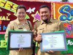 bidan-lesti-rahmawati-kiri-bersama-seorang-tenaga-kesehatan-usai-menerima.jpg