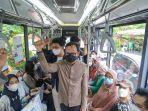 bima-naik-bus.jpg
