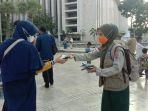 bnpb-bagikan-masker.jpg