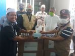bnpb-bantu-masker-dan-hand-sanitizer-ke-sekretariat-dpp-fpi_20201114_145052.jpg