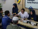 bod-mandiri-tunas-finance-memberikan-pelayanan_20180905_225639.jpg