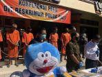 boneka-doraemon-disita.jpg