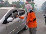 bpbd-kabupaten-muarojambi-bagikan-masker.jpg