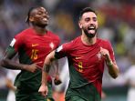 bruno-fernandes-selebrasi-usai-cetak-gol_20221129_041150.jpg