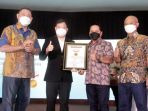 bsi-pecahkan-rekor-muri-pemotongan-1300-tumpeng-kue-tradisional_20211102_141920.jpg