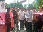 bupati-pelalawan-hm-harris-dan-gubernur-riau-h-syamsuar-pantau-pemilu.jpg