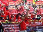 buruh-gelar-aksi-damai-di-depan-gedung-sate-sambut-may-day_20190501_233858.jpg