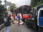 bus-mini-transjakarta-terguling-nih2_20180920_154132.jpg