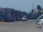 bus-siap-menjemput-pengungsi-gempa-palu_20181004_115350.jpg