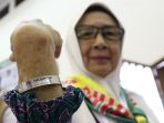 calon-jamaah-haji-tiba-di-asrama-haji-pondok-gede_20230523_155811.jpg