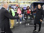 carlo-ancelotti-dan-xavi-hernandez-sebelum-el-clasico.jpg