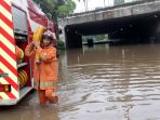 cawang-banjir-underpass-uki-tak-bisa-dilewati_20200102_042047.jpg
