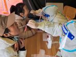 china-lakukan-tes-covid-19-massal_20220315_075638.jpg
