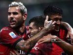 christian-pulisic-tengah-merayakan-gol-bersama-theo-hernandez-kiri.jpg