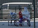 covid-19-makin-menggila-beijing-perketat-pembatasan_20220527_152457.jpg