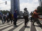 cuaca-panas-jakarta-di-tengah-musim-hujan_20231222_140107.jpg