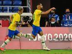 cunha-dan-richarlison-merayakan-gol.jpg