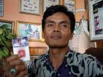 dadang-mulya-menunjukkan-bungkus-rokok_20180725_082125.jpg