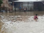 dampak-luapan-bantaran-kali-ciliwung-membuat-sebagian-wilayah-tergenang_20170216_151835.jpg
