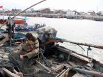 dampak-pandemi-covid-19-bagi-nelayan-palabuhan-tanjung-emas-sema_20200508_125634.jpg
