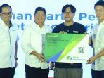 daniel-minardi-lewat-penyerahan-kartu-kepesertaan-kepada-para-mitra-dan-pengguna.jpg