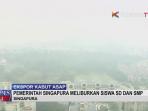 dapat-kiriman-kabut-asap-pemerintah-singapura-liburkan-siswa-sd-dan-smp-2_20150926_195957.jpg
