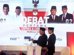 debat-pertama-capres-dan-cawapres_20190117_231957.jpg