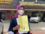 debi-novita-istri-dari-aipda-rh-anggota-polsek-percut-seituan.jpg