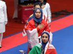 defia-rosmaniar-sumbang-emas-pertama-untuk-indonesia_20180819_184647.jpg