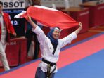 defia-rosmaniar-sumbang-emas-pertama-untuk-indonesia_20180819_185021.jpg