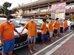 delapan-tersangka-pembobol-sistem-grab-car-yang-diamankan-satreskrim-polrestabes-medan_20180222_105726.jpg