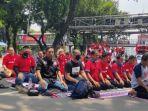 demo-ksbsi-di-patung-kuda-uu-cipta-kerja-4.jpg