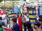 demo-penundaan-pilkada-2020-ditengah-covid-19_20200911_120513.jpg