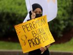 demo-peringatan-hari-perempuan-internasional_20210308_194706.jpg