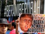 demo-tolak-kebijakan-presiden-as-donald-trump_20170206_113722.jpg