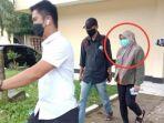 detik-detik-andi-merya-nur-keluar-dari-ruang-pemeriksaan-polda-sultra.jpg