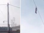 detik-detik-bocah-bergelantungan-di-kabel-sutetjpg.jpg