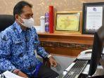 dewa-gede-rai-saat-menerima-penghargaan-anugerah-humas-indonesia.jpg