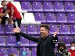 diego-simeone-pelatih-atletico-madrid-merayakan-kemenangan-juara-laliga.jpg