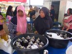 dinas-perdagangan-kota-palembang-gelar-sembako-murah_20231130_183747.jpg