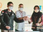 dini-desriani-saat-penandatanganan-kerjasama.jpg