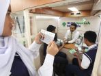 direktur-bisnis-bsb-sumbang-mobil-yayasan-pgii_20170126_131413.jpg